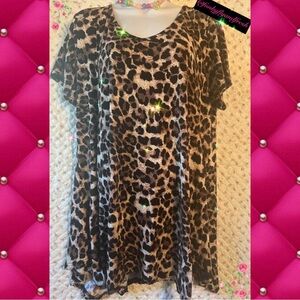 Larace 1x plus size like new short sleeve leopard print loose fit flare blouse.